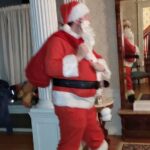 santa arrives with pack full of treats
