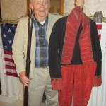 photo of Chuck King with rifle and war uniform