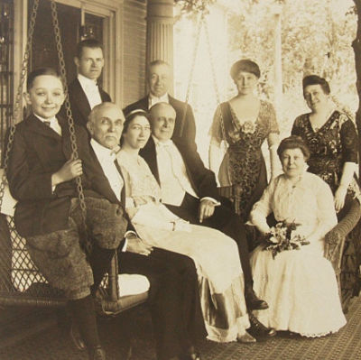 vintage photo of folks sitting on a porch