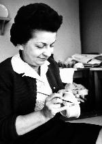 photo of louise shoaf hand applying liquid gold to soup bowl