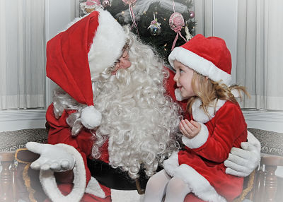 photo of little girl with santa claus