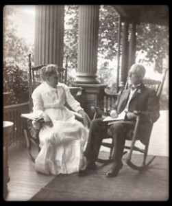 photo of ET and Ella Frampton Kurtz sitting on porch of their house