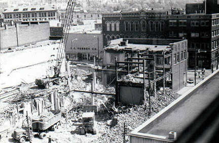 Destruction of downtown buildings including Lawrence Savings and Trust