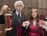 author and critic mark dawidziak and actress sara showman in stage costumes